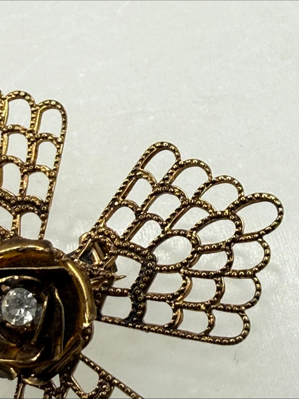 Gold Filigree Floral Brooch with Clear Crystal Center